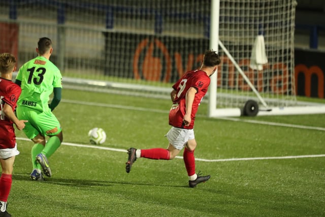 Camberley's Macauley Martin scores his second goal. Picture by Dave Haines.