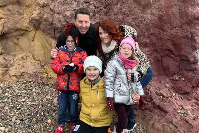 Ross Pollock with his family, son Jimmy (middle) wife Irina (top right) and twins Jasmine and Jack, as Mr Pollock is aiming to roller skate 1,000 miles to raise money for a neonatal charity in which his twins spent months in hospital after being born prematurely. Issue date: Thursday May 12, 2022.