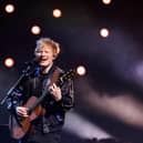 Ed Sheeran performed at the Concert for Ukraine, which raised £12.2 million for  the humanitarian effort. Pictured is the singer and songwriting performing  on stage during the BRIT Awards 2022 ceremony and live show,  in London, on February 8, 2022. Picture: TOLGA AKMEN/AFP via Getty Images.