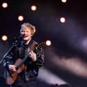 Ed Sheeran performed at the Concert for Ukraine, which raised £12.2 million for  the humanitarian effort. Pictured is the singer and songwriting performing  on stage during the BRIT Awards 2022 ceremony and live show,  in London, on February 8, 2022. Picture: TOLGA AKMEN/AFP via Getty Images.