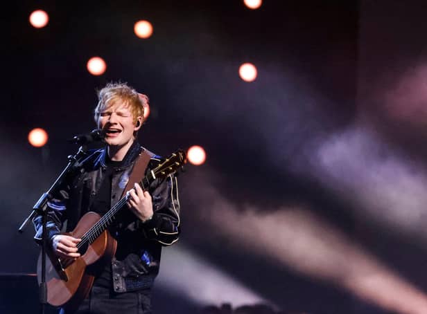 Ed Sheeran performed at the Concert for Ukraine, which raised £12.2 million for  the humanitarian effort. Pictured is the singer and songwriting performing  on stage during the BRIT Awards 2022 ceremony and live show,  in London, on February 8, 2022. Picture: TOLGA AKMEN/AFP via Getty Images.