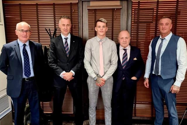 Liam Wiseman, centre, with father and coach Daron Wiseman, far right, as well as British Boxing Board of Control members