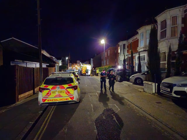 Paramedics checked the man while police officers closed down the road as they investigated.