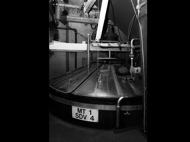 Gales Brewery at Horndean 3rd October 2003. Mash Tun 1. (The mash tun can hold 3 tonnes of malt from which 135 barrels of HSB can be produced.  The brewer mashes by mixing hot liquor with the crushed malt and then drains the extract after a stand time of 30 minutes.  The extract is known as sweet wort.). Picture: David Garvey 033382-1
