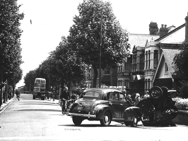 Pedestrians allowed to walk by. Possibly Laburnum Grove or Stubbington Avenue, a collision, but pedestrians just stroll by. Picture: Colin Hull collection.