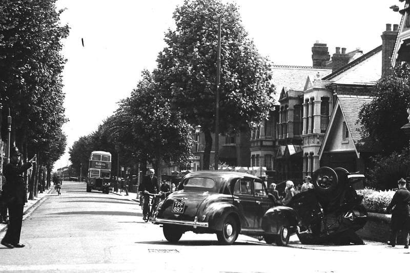 Pedestrians allowed to walk by. Possibly Laburnum Grove or Stubbington Avenue, a collision, but pedestrians just stroll by. Picture: Colin Hull collection.