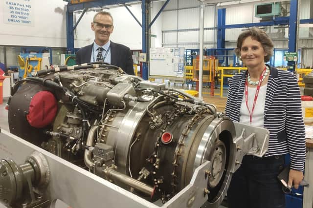 Meon Valley MP Flick Drummond, right, has written to the MoD about the future of a contract for Whiteley-based firm Safran to fix military helicopter engines. Mrs Drummond is pictured with Nick Earl, chief executive of Safran.