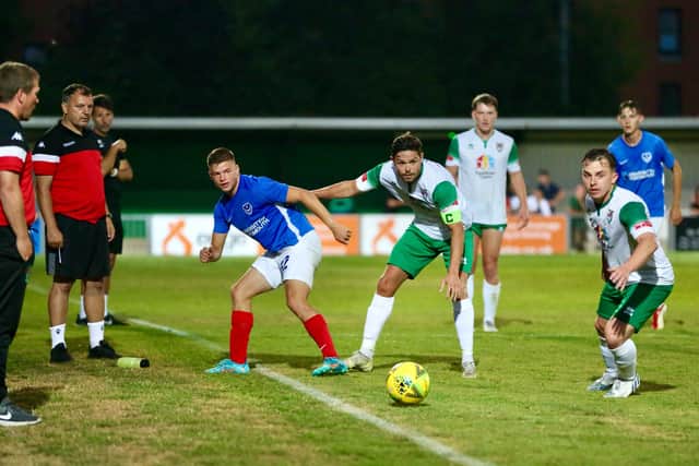 Danny Cowley, far left, watches on as a Pompey XI earn a 1-1 draw at Nyewood Lane on Tuesday night. Picture: Martin Denyer