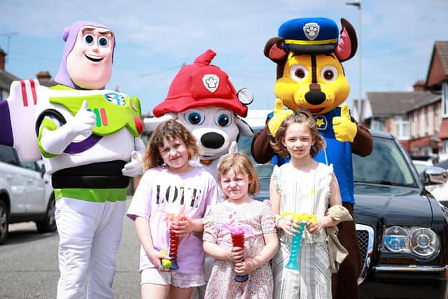 Tallulah George, 7, Aurora George, 5, and Jessica Nash, 10, with some special guests at the Cosham fayre. 
Picture: Chris Moorhouse