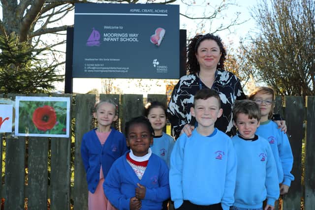 Staff and pupils from Moorings Way Infant School.