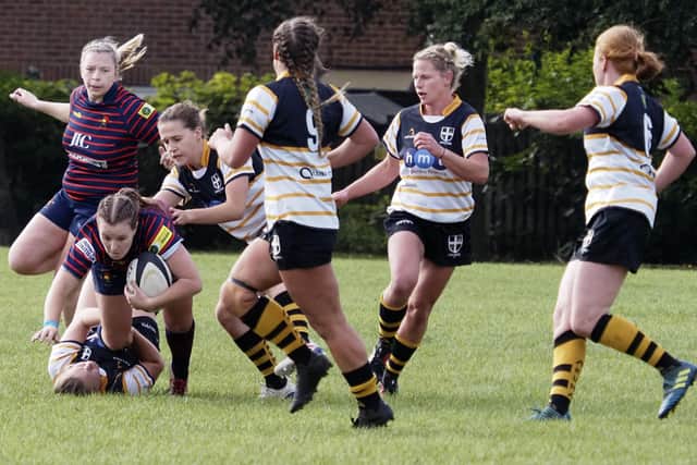 Valkyries (black shorts) v Trojans. Picture: Barry Zee