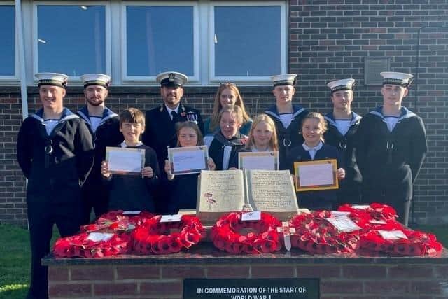Clanfield Junior School pupils with sailors from HMS Collingwood.