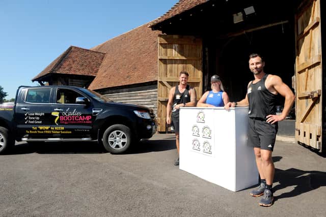 The Ladies Only Bootcamp at The Health & Fitness Barn Hampshire in Titchfield.Pictured is: (l-r) Coach Sam Harlow and Beckie Gill with owner Liam Walsh.Picture: Sarah Standing (070820-2301)