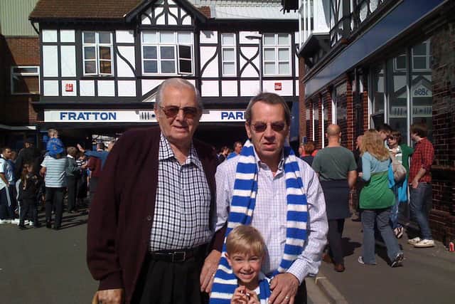 Three generation of the Williams family at their beloved Fratton Park. The late Harry (left), Mick (right) and Will (front)