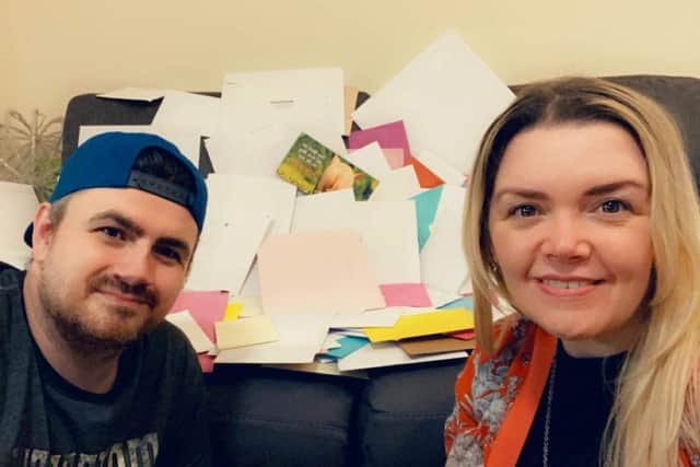 Stephen Ayres and Natasha Kirkby with all the birthday cards.