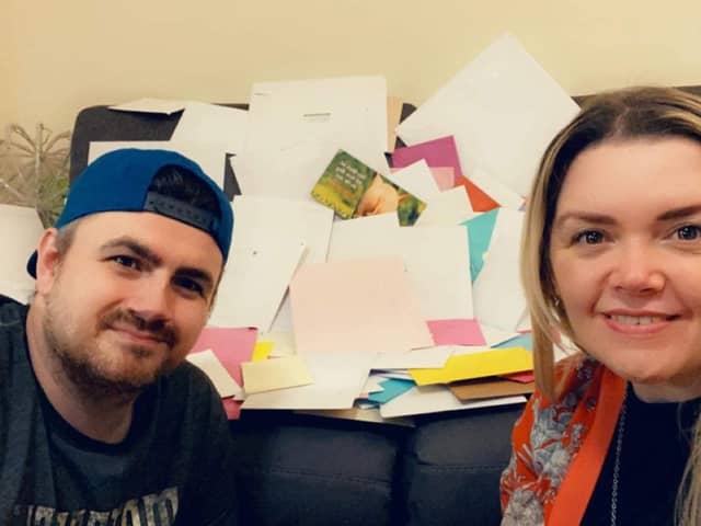 Stephen Ayres and Natasha Kirkby with all the birthday cards.