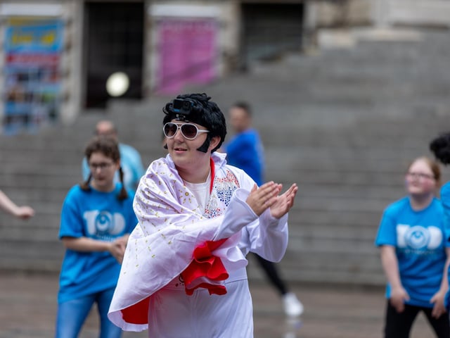 A 250 person strong flash mob took over Guildhall Square to celebrate Portsmouth's 100 years as a city. Pictured - The Flash mob took over Guildhall Square Photos by Alex Shute