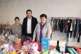 Havant MP Alan Mak at the Mrs Claus Curiosity Shop with volunteers Dee Tupper (left) and Kim Benham