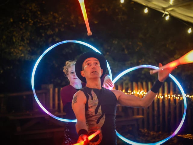 A juggler performing near the zoo's Cafe Graze