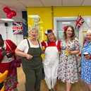 Cllr Gemma Furnivall with Hub Volunteers dressed in 1940's style outfits.