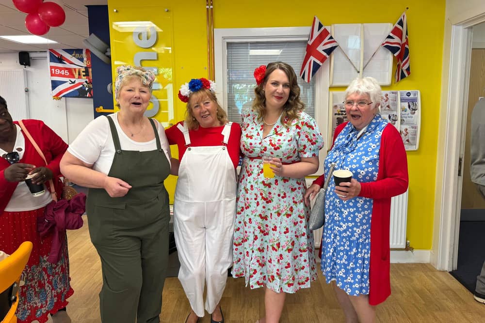 Cllr Gemma Furnivall with Hub Volunteers dressed in 1940's style outfits.