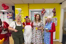 Cllr Gemma Furnivall with Hub Volunteers dressed in 1940's style outfits.