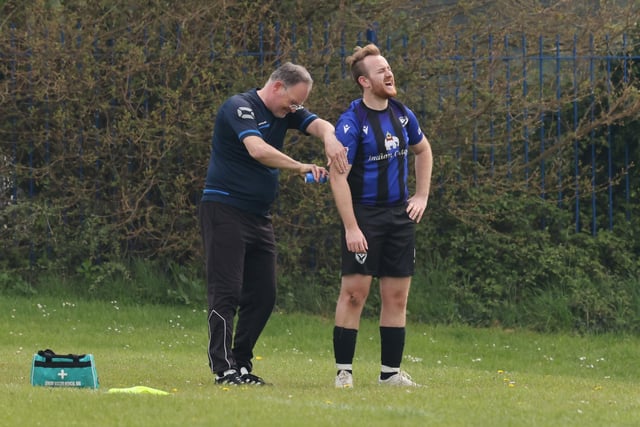 A Horndean Hawks player receives treatment during their 6-1 loss against Pompey Chimes. Picture: Kevin Shipp