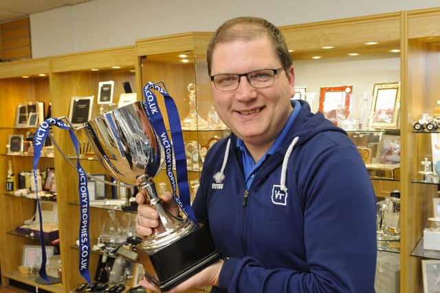 Mark Hooper from Victory Trophies. Picture by: Malcolm Wells (181024-6978)