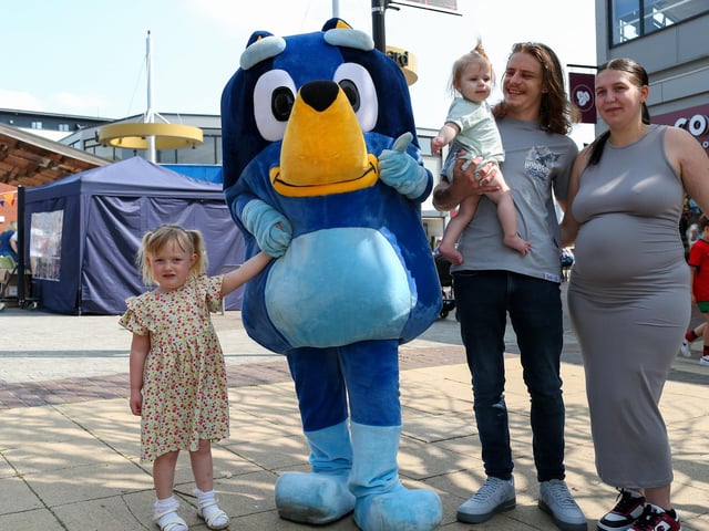 From left, Florence Sweatman, 3, Stanley Ide with Matilda, 9 months, and Morgan Barham all meet Bluey. Waterlooville Music and Arts Festival took place in the precinct, Waterlooville
Picture: Chris Moorhouse (170824-58)