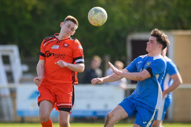 Action from the 2-2 draw between AFC Portchester under-23s (orange and black kit) and Liphook United. Picture: Keith Woodland (150421-916)