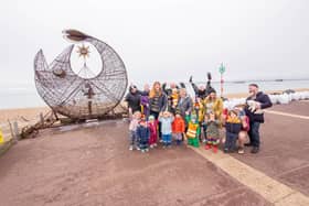 Artist Pete Codling, with local childcare groups, Vikkis childcare, Toodles Tots Childminding, Sophie's Childminding, Sharon's Childminding and RAOK group who helped empty it
Picture: Habibur Rahman