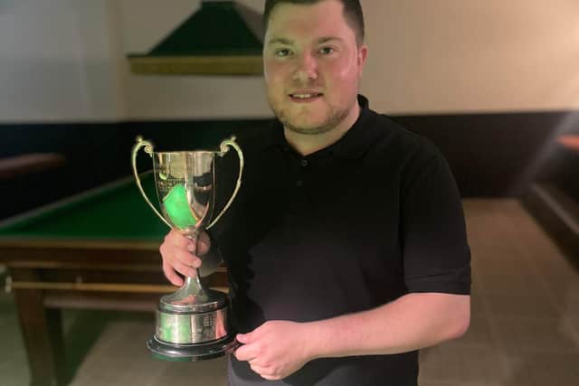 James Budd with his Gosport & Fareham Snooker League silverware