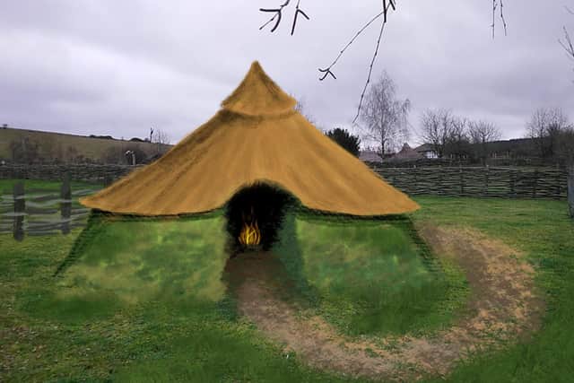 An artists impression of what the new roundhouse at Butser Ancient Farm will look like.