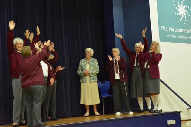 Former pupils on stage with Mrs Mudd at The Portsmouth Academy