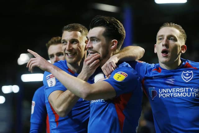 John Marquis celebrates
