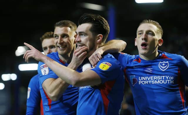 John Marquis celebrates