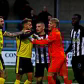Tempers rise during Gosport's FA Trophy elimination at Dorchester Town. Picture by Tom Phillips.
