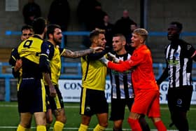 Tempers rise during Gosport's FA Trophy elimination at Dorchester Town. Picture by Tom Phillips.