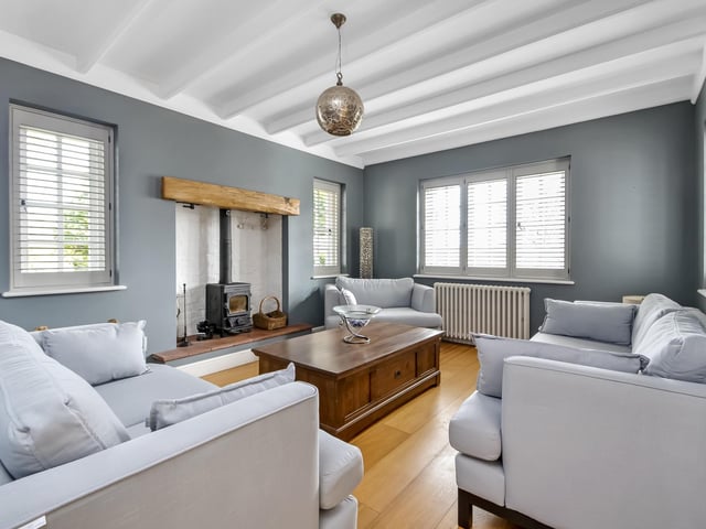 This four bedroom detached house in Green Lane, Hambledon, is on sale for £1,895,000. It is listed by Fine and Country.