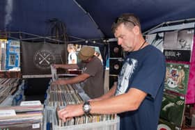 The Summer Fayre held at Castle Road in Southsea - Looking through LPs at Alex Cave's record stall.  Picture: Vernon Nash (180410-003)