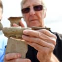 Waterlooville treasure hunters, Lee McGowan (left) and Peter Beasley with one of their discoveries. Picture: Malcolm Wells