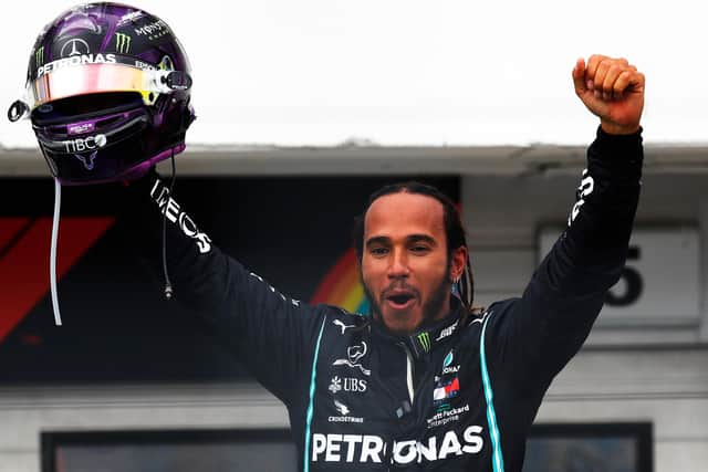 Lewis Hamilton celebrates a Grand Prix win in 2020. Photo by Leonhard Foeger/Pool via Getty Images.