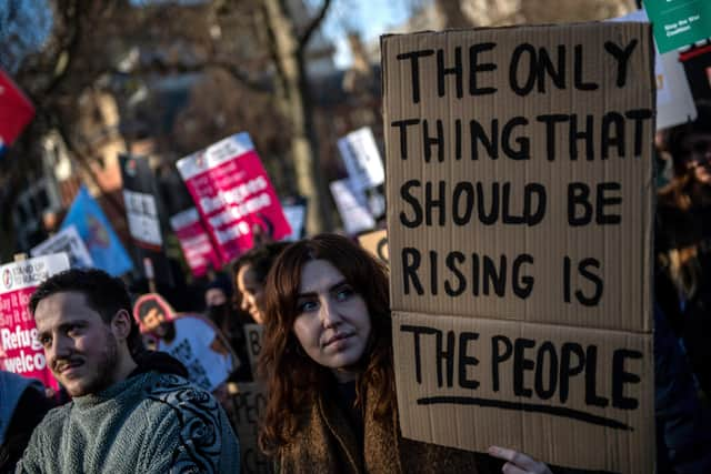 Protesters attend a demonstration in Parliament Square about the rising cost of living and energy bills on February 12, 2022 in London, United Kingdom. Photo by Chris J Ratcliffe/Getty Images