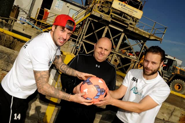 Flashback - Sam Willett, right, with Chaz Gardner and then Baffins boss Louis Bell in March 2015. Picture: Malcolm Wells
