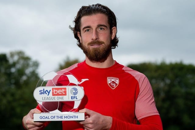 The striker has been one of the shock performers of the season, finishing joint third in the goal scoring charts. In a bid to keep their prized asset at the club, Morecambe have tabled a fresh contract for the 28-year-old, although there has been no agreement yet. The 23-goal striker has attracted interest from Pompey, Bolton, Preston and Rotherham who are all keen on the forward’s services.