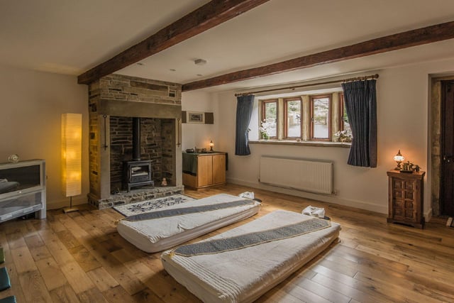 The house features six reception rooms in total, including two snug sitting rooms which have been lovingly converted.