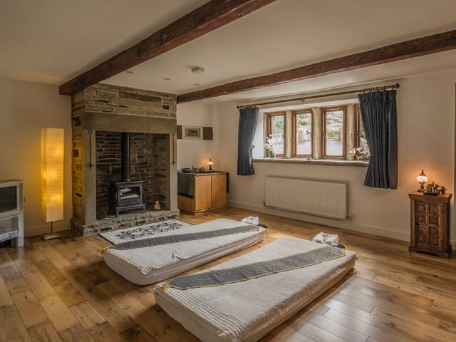 The house features six reception rooms in total, including two snug sitting rooms which have been lovingly converted.