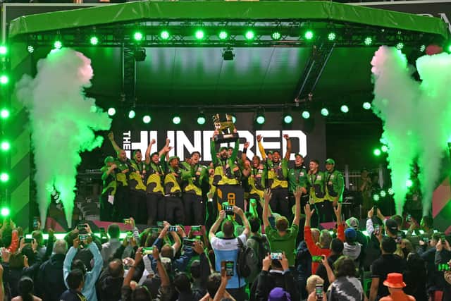 Southern Brave captain James Vince lifts the inaugural Hundred silverware last summer. Photo by Stu Forster/Getty Images.