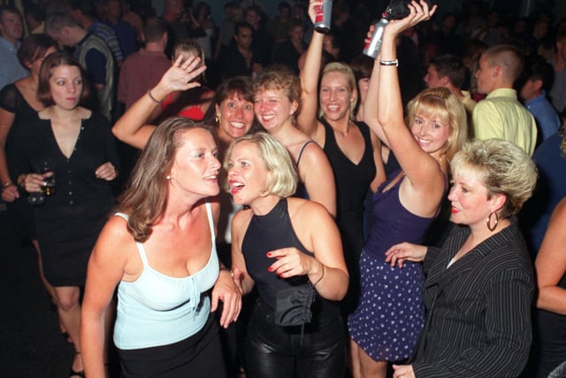 Revellers dancing the night away at Buddies 25+ nightclub at The Pyramids Centre, Southsea.