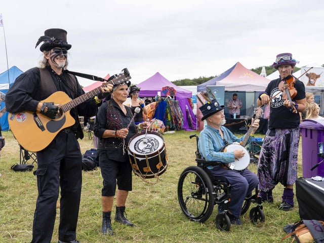 Morris Dancers warm up and entertain the passing crowds at Wickham Festival
